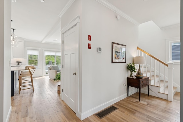 25 Benjamin Way, Portland, ME 04102 - hallway featuring ornamental molding, light wood finished floors, stairs, and baseboards