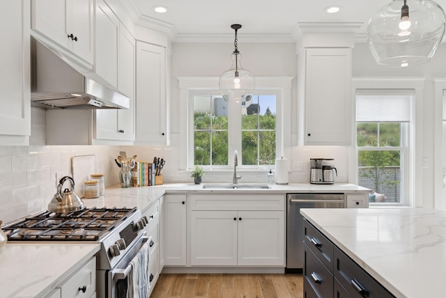 25 Benjamin Way, Portland, ME 04102 - kitchen featuring stainless steel appliances, a sink, under cabinet range hood, white cabinetry, and ornamental molding