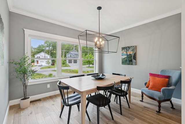 25 Benjamin Way, Portland, ME 04102 - dining room featuring baseboards, light wood-style floors, ornamental molding, and a chandelier