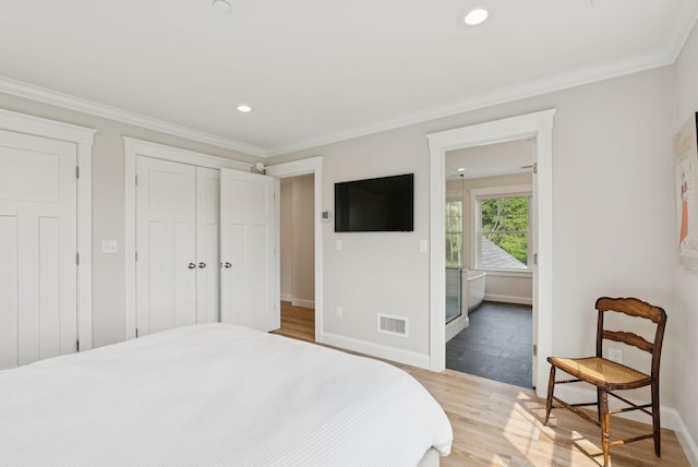 25 Benjamin Way, Portland, ME 04102 - bedroom with baseboards, light wood-style flooring, a closet, recessed lighting, and crown molding