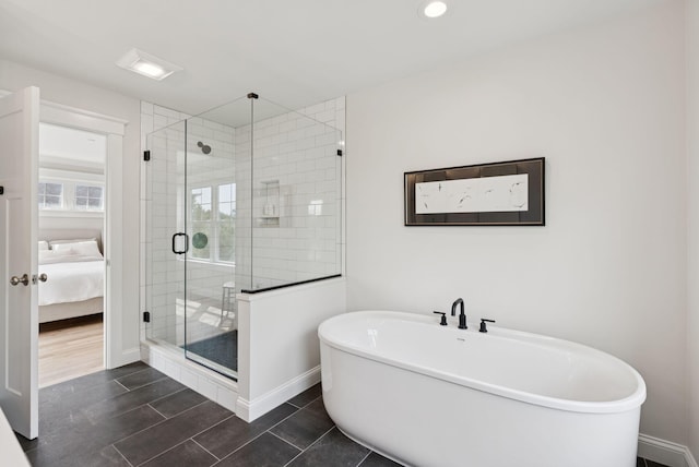 25 Benjamin Way, Portland, ME 04102 - ensuite bathroom with a soaking tub, a stall shower, baseboards, recessed lighting, and tile patterned floors