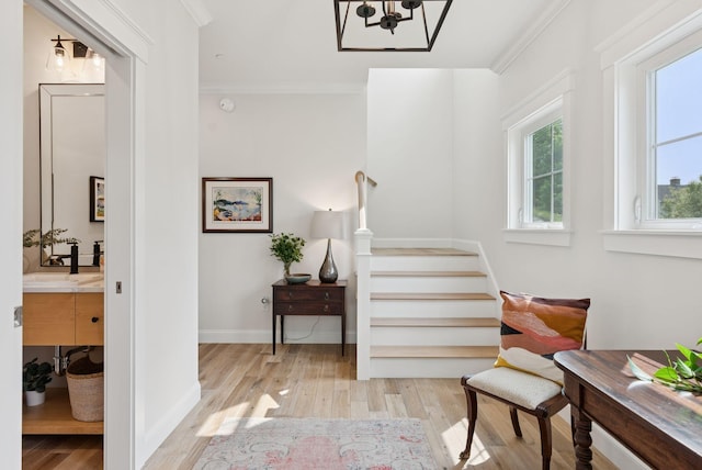 25 Benjamin Way, Portland, ME 04102 - stairway with a chandelier, wood finished floors, crown molding, and baseboards