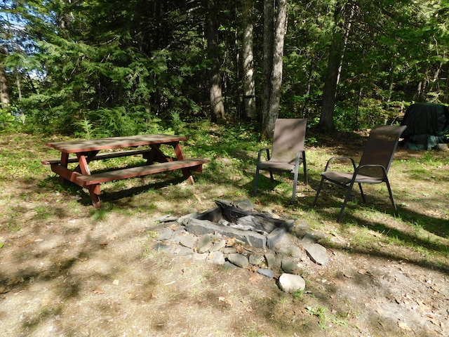 51 Pond Rd, Abbot, ME 04406 - view of home's community with a fire pit