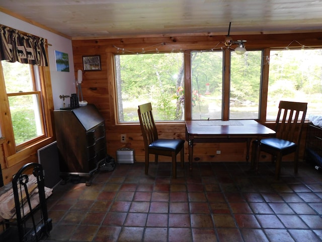 51 Pond Rd, Abbot, ME 04406 - dining space featuring plenty of natural light and wooden walls
