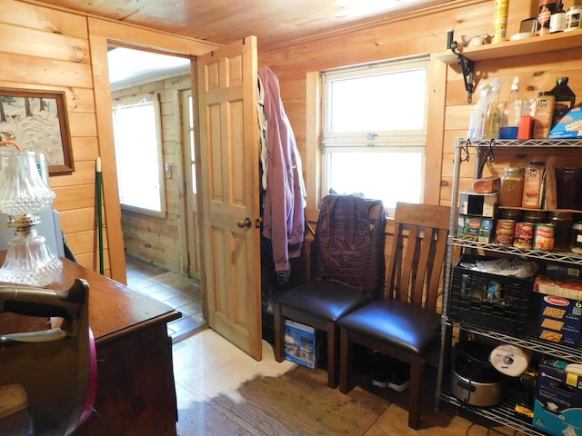 51 Pond Rd, Abbot, ME 04406 - sitting room featuring wood walls and wood ceiling