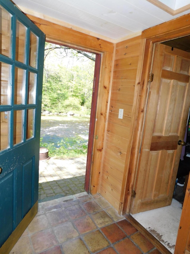 51 Pond Rd, Abbot, ME 04406 - doorway featuring stone finish floors