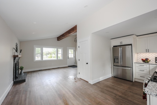 1 Knowlton Rd, Nashua, NH 03063 - kitchen featuring stainless steel refrigerator with ice dispenser, tasteful backsplash, dark wood-type flooring, and white cabinets