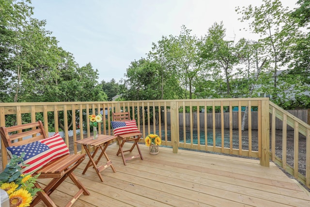 1 Knowlton Rd, Nashua, NH 03063 - wooden deck with a fenced backyard and view of scattered trees