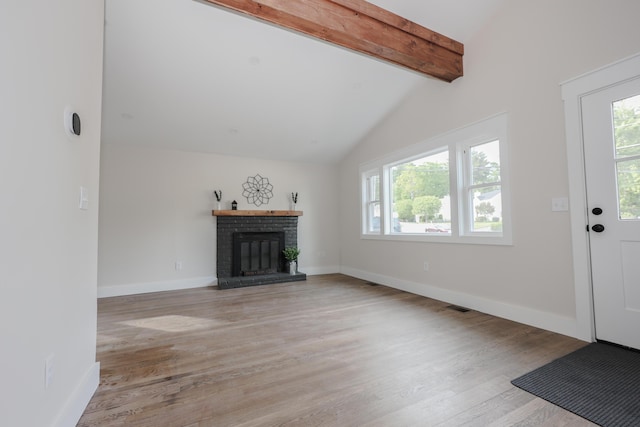 1 Knowlton Rd, Nashua, NH 03063 - unfurnished living room featuring a fireplace, light wood-style flooring, and baseboards