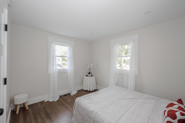 1 Knowlton Rd, Nashua, NH 03063 - bedroom with multiple windows, wood finished floors, and baseboards
