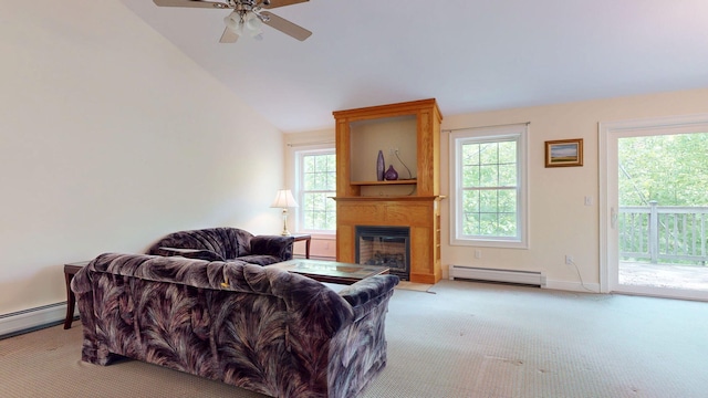 40 Acorn Ridge Rd, Freeport, ME 04032 - carpeted living area with baseboard heating, a large fireplace, a ceiling fan, lofted ceiling, and baseboards