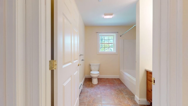 40 Acorn Ridge Rd, Freeport, ME 04032 - bathroom with a baseboard heating unit, toilet, baseboards, tub / shower combination, and vanity