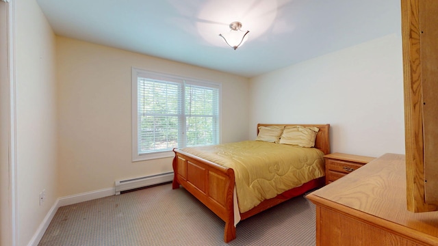 40 Acorn Ridge Rd, Freeport, ME 04032 - bedroom with a baseboard radiator, light colored carpet, and baseboards