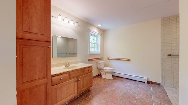 40 Acorn Ridge Rd, Freeport, ME 04032 - full bath featuring a baseboard radiator, vanity, toilet, and a shower