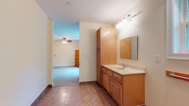 40 Acorn Ridge Rd, Freeport, ME 04032 - bathroom featuring vanity, ceiling fan, and baseboards