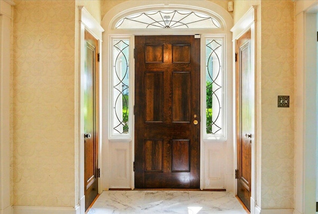 11 Pine Ave, Livermore Falls, ME 04254 - foyer entrance with wallpapered walls and marble finish floors