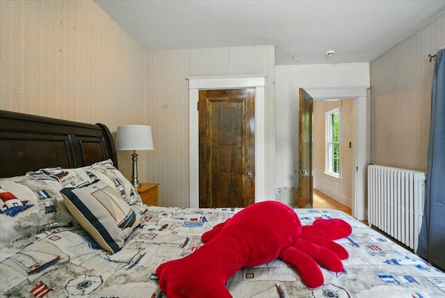 11 Pine Ave, Livermore Falls, ME 04254 - bedroom featuring radiator and wallpapered walls