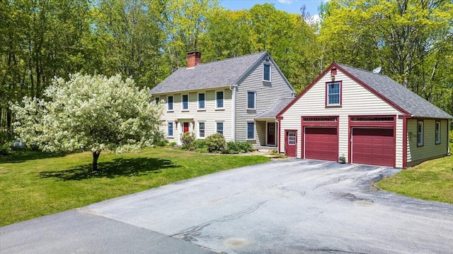 465 S St, Rockport, ME 04856 - colonial inspired home with a chimney, a front lawn, asphalt driveway, and a shingled roof