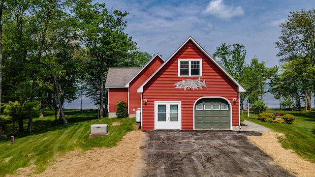 177 Meadow Ln, Smithfield, ME 04978 - garage with asphalt driveway