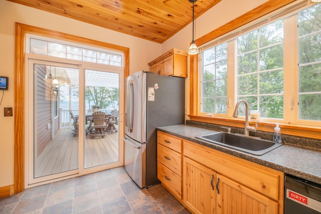 177 Meadow Ln, Smithfield, ME 04978 - kitchen with a sink, freestanding refrigerator, dark countertops, healthy amount of natural light, and wood ceiling