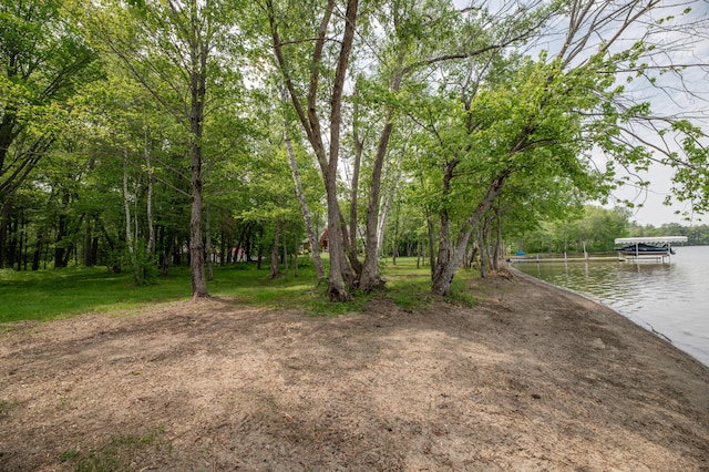 177 Meadow Ln, Smithfield, ME 04978 - view of yard featuring a dock and a water view