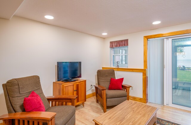 177 Meadow Ln, Smithfield, ME 04978 - sitting room featuring healthy amount of natural light, light wood-style floors, recessed lighting, and baseboards