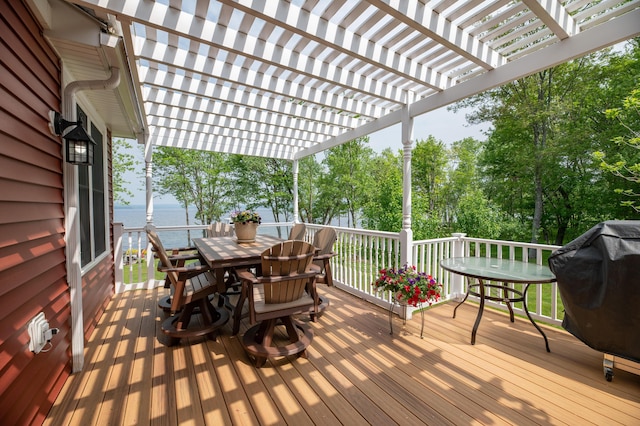 177 Meadow Ln, Smithfield, ME 04978 - wooden terrace with outdoor dining area, a water view, a pergola, view of scattered trees, and area for grilling