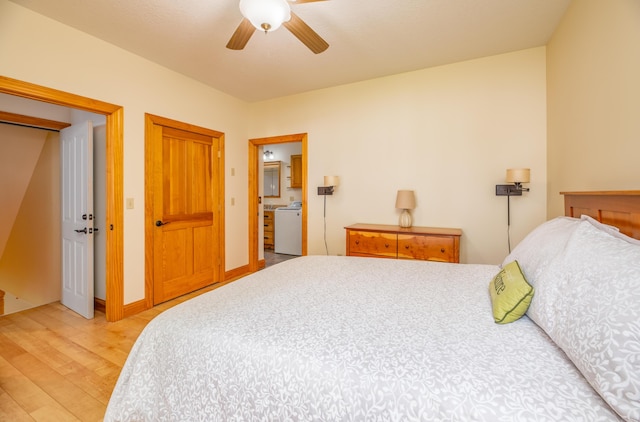177 Meadow Ln, Smithfield, ME 04978 - bedroom with washer / dryer, light wood finished floors, and a ceiling fan