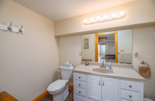 177 Meadow Ln, Smithfield, ME 04978 - bathroom featuring toilet, vanity, and a textured ceiling
