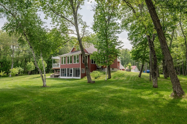 177 Meadow Ln, Smithfield, ME 04978 - view of green lawn with a sunroom