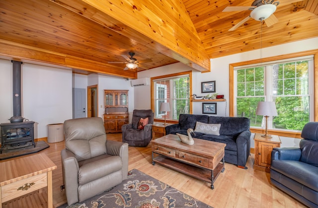 177 Meadow Ln, Smithfield, ME 04978 - living area featuring a ceiling fan, a wood stove, wood ceiling, light wood-type flooring, and an AC wall unit