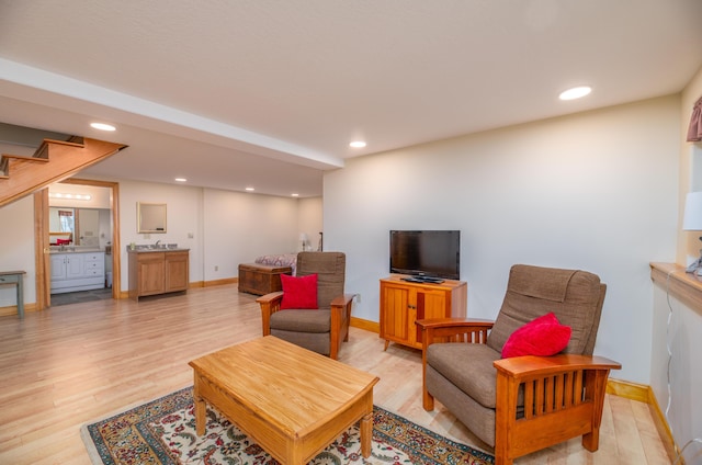 177 Meadow Ln, Smithfield, ME 04978 - living area with light wood-type flooring, baseboards, recessed lighting, and stairs