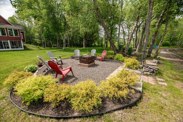 177 Meadow Ln, Smithfield, ME 04978 - view of green lawn featuring a fire pit