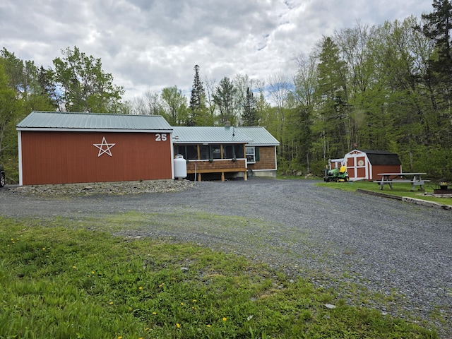 25 Oak Ridge Rd, Shirley, ME 04485 - view of front of house featuring metal roof