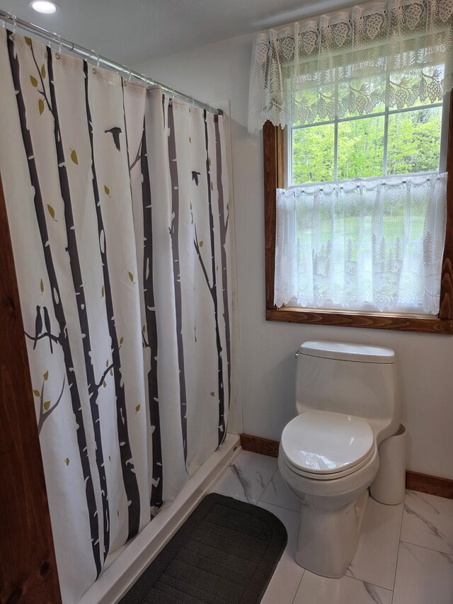 25 Oak Ridge Rd, Shirley, ME 04485 - bathroom featuring baseboards, marble finish floors, toilet, and curtained shower