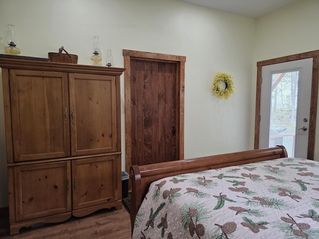 25 Oak Ridge Rd, Shirley, ME 04485 - bedroom featuring wood finished floors and access to outside
