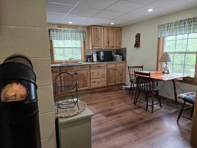 25 Oak Ridge Rd, Shirley, ME 04485 - kitchen with light brown cabinetry, a sink, wood finished floors, a drop ceiling, and tasteful backsplash