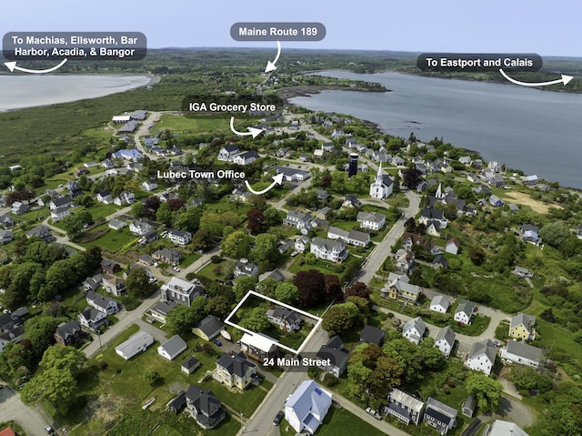 24 Main St, Lubec, ME 04652 - aerial view of property's location featuring property boundaries highlighted, a large body of water, and nearby suburban area