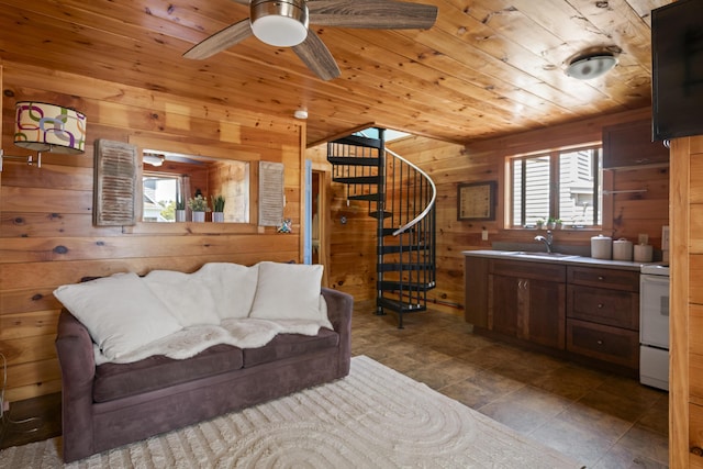 23 N Ave Unit 23, Saco, ME 04072 - living area featuring wooden walls, stairs, wood ceiling, and a ceiling fan
