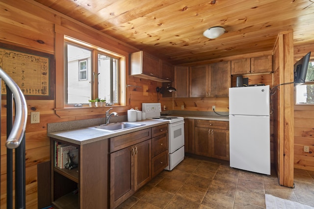 23 N Ave Unit 23, Saco, ME 04072 - kitchen featuring white appliances, wood ceiling, a sink, light countertops, and wood walls