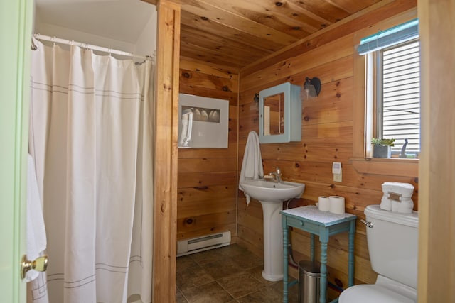 23 N Ave Unit 23, Saco, ME 04072 - full bathroom with a baseboard radiator, wood ceiling, plenty of natural light, toilet, and wooden walls
