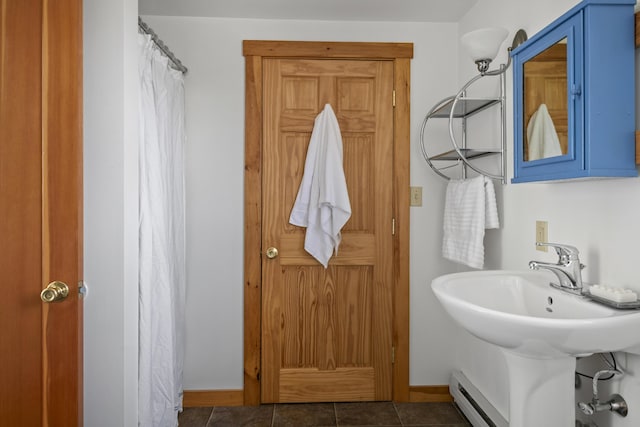 23 N Ave Unit 23, Saco, ME 04072 - full bathroom featuring a baseboard radiator, baseboards, and a shower with shower curtain