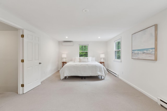 1 Dresden Ct Unit 1, Portland, ME 04103 - carpeted bedroom with a baseboard heating unit, baseboard heating, a wall mounted air conditioner, baseboards, and recessed lighting