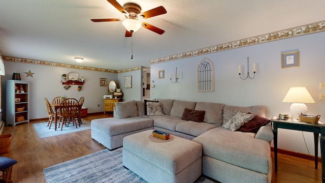 76 Parkview Ave, Livermore Falls, ME 04254 - living room featuring ceiling fan and wood finished floors