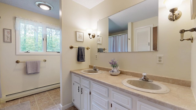 76 Parkview Ave, Livermore Falls, ME 04254 - full bath with double vanity, a baseboard heating unit, and a shower with curtain