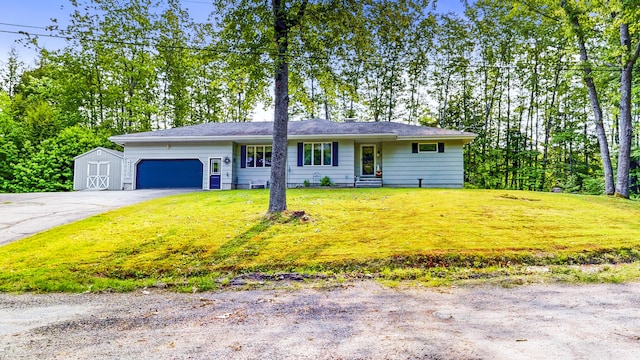 76 Parkview Ave, Livermore Falls, ME 04254 - ranch-style home with an attached garage, driveway, a front lawn, and a storage shed