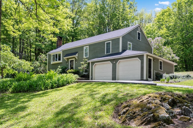 3 Wilson Ln, Saco, ME 04072 - split foyer home with a chimney, a front lawn, and a shingled roof