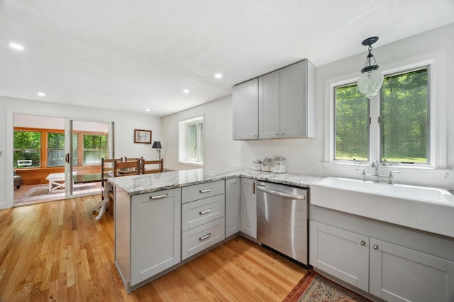 3 Wilson Ln, Saco, ME 04072 - kitchen with stainless steel dishwasher, gray cabinets, a peninsula, light wood-style flooring, and recessed lighting
