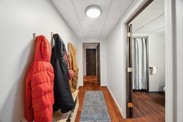 3 Wilson Ln, Saco, ME 04072 - corridor with wood finished floors, a paneled ceiling, and baseboards