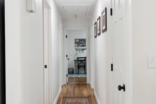 3 Wilson Ln, Saco, ME 04072 - corridor with attic access, light wood-style flooring, and baseboards